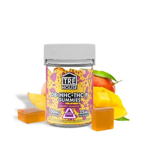 Trē house tropic mango gummies by thcgummies. Com. Featured photo of the bottle and the gummies with a full size mango and sliced mango chunks in the background.