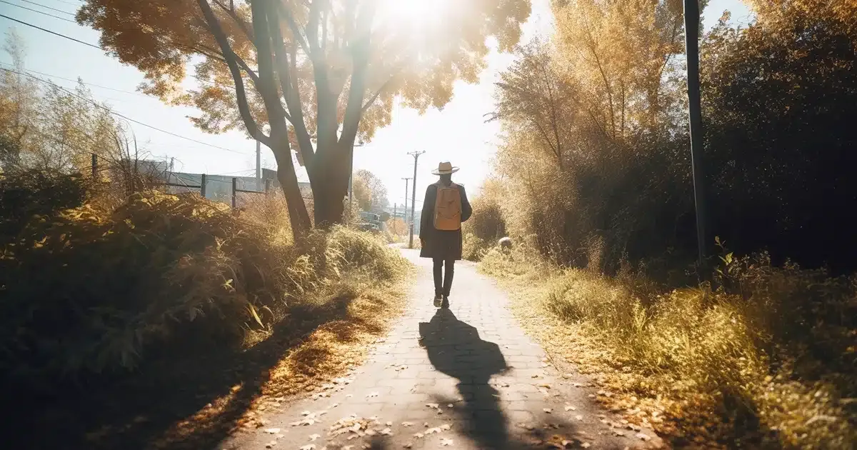 Man goes outside for a nice walk to keep his mind away from negative thoughts.