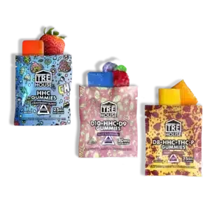 3 types of THC gummy sample packs made by TREHouse. Each edible sample pack has the top open with the respective gummy sticking out of the top to give the viewer an idea of what the gummy looks like.